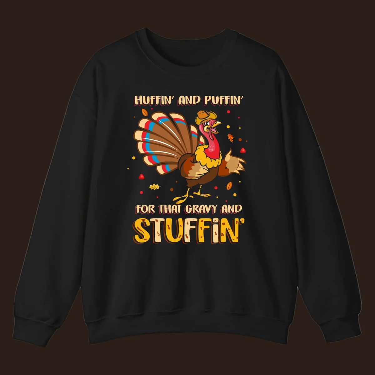Cartoon turkey with fanned feathers and text 'Huffin And Puffin For Gravy Stuffin'