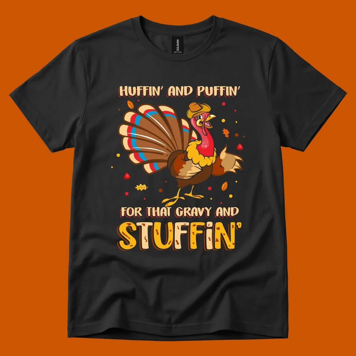 Cartoon turkey with fanned feathers and text 'Huffin And Puffin For Gravy Stuffin'