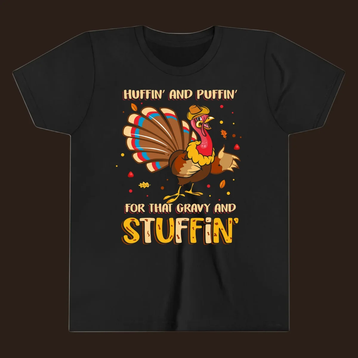 Cartoon turkey with fanned feathers and text 'Huffin And Puffin For Gravy Stuffin'