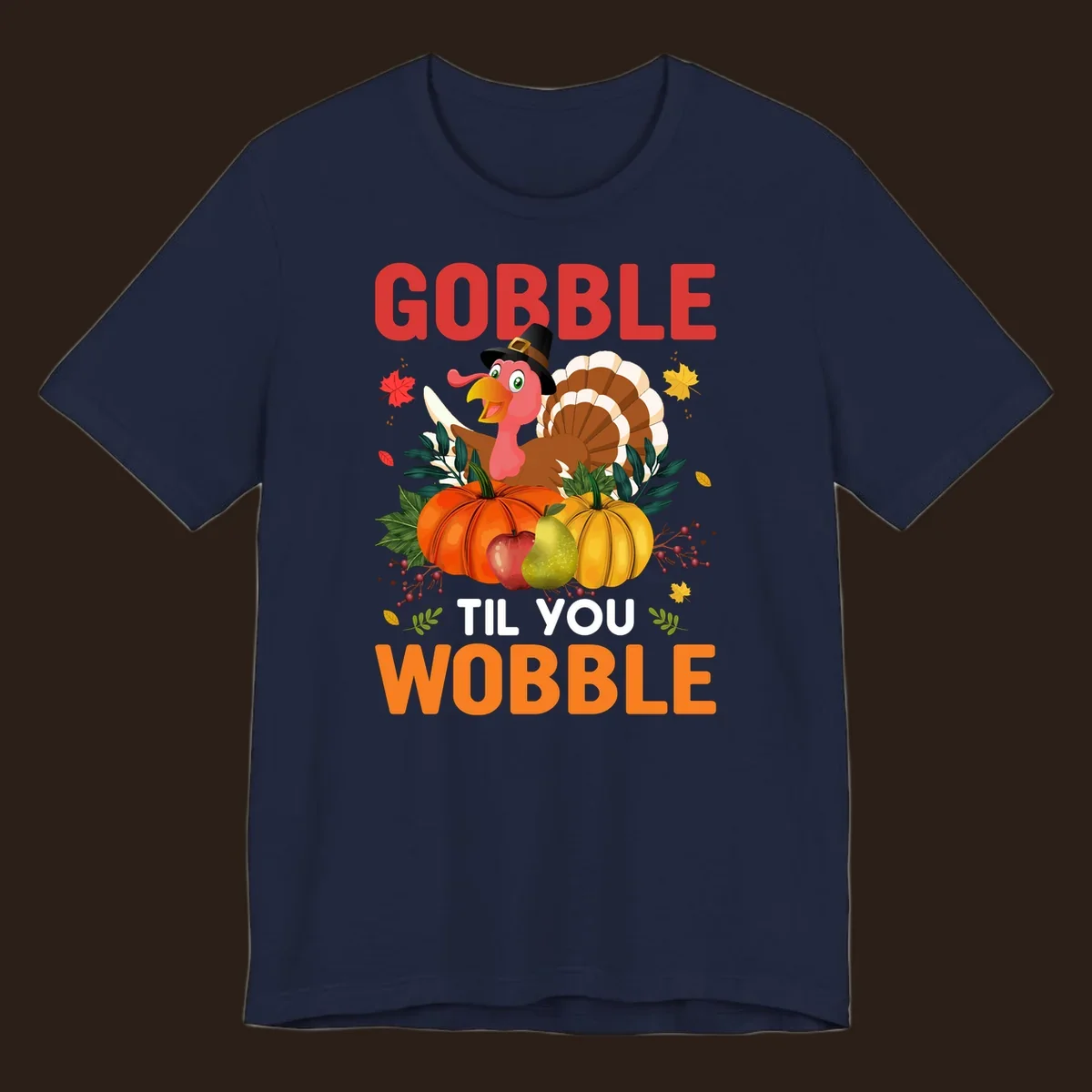 Gobble Til You Wobble Thanksgiving turkey illustration with pumpkins and text.