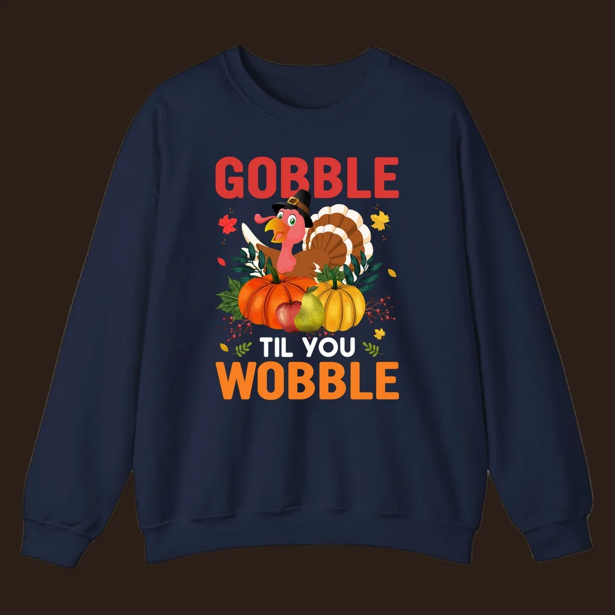 Gobble Til You Wobble Thanksgiving turkey illustration with pumpkins and text.