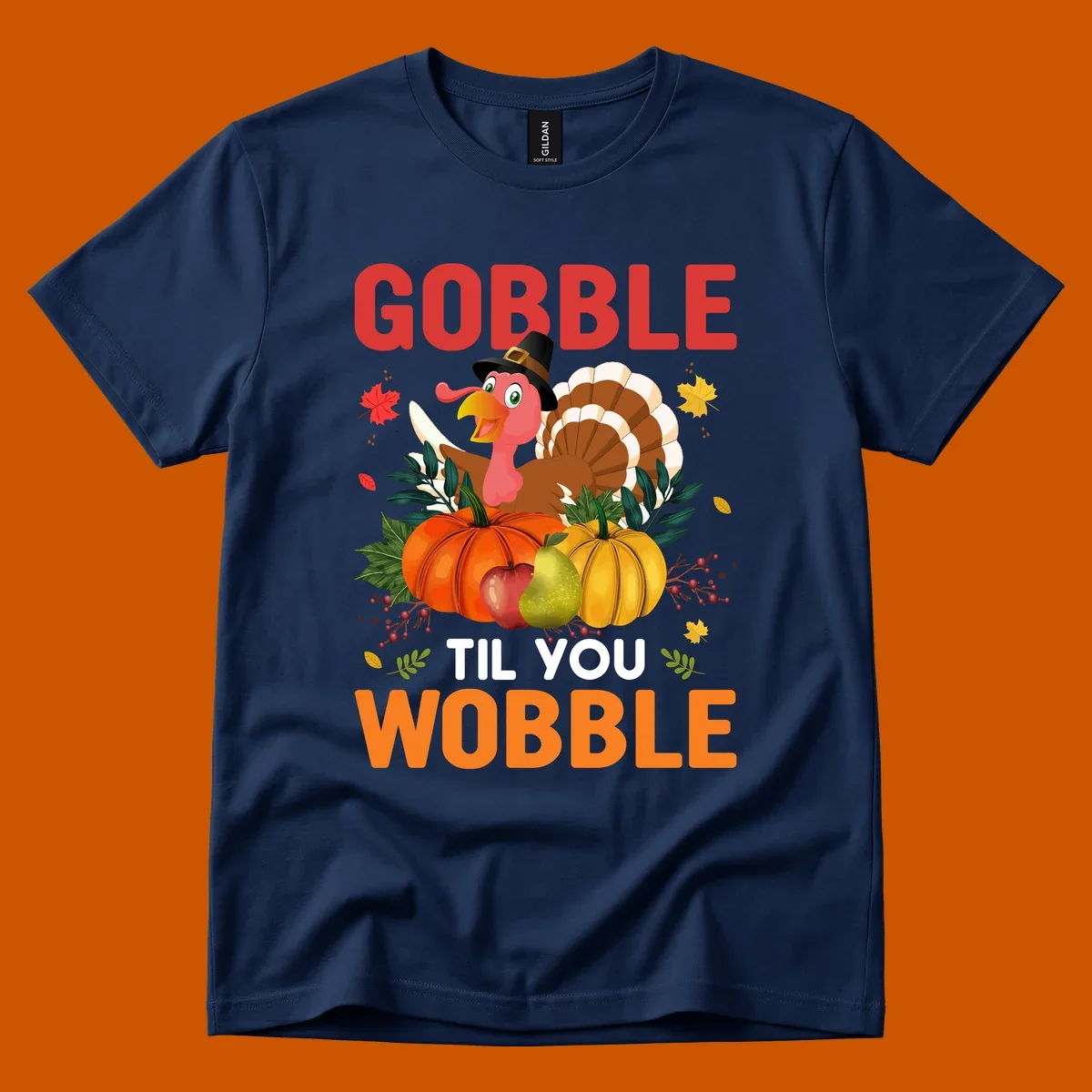 Gobble Til You Wobble Thanksgiving turkey illustration with pumpkins and text.