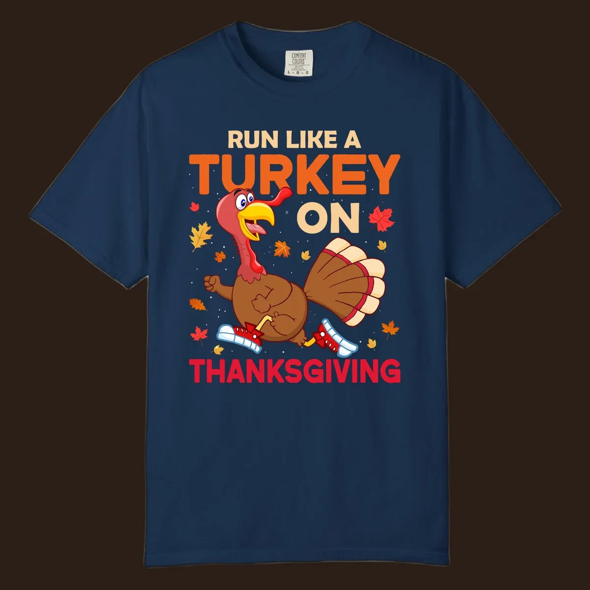Cartoon turkey running with text Run Like A Turkey On Thanksgiving, autumn leaves and snowflakes.