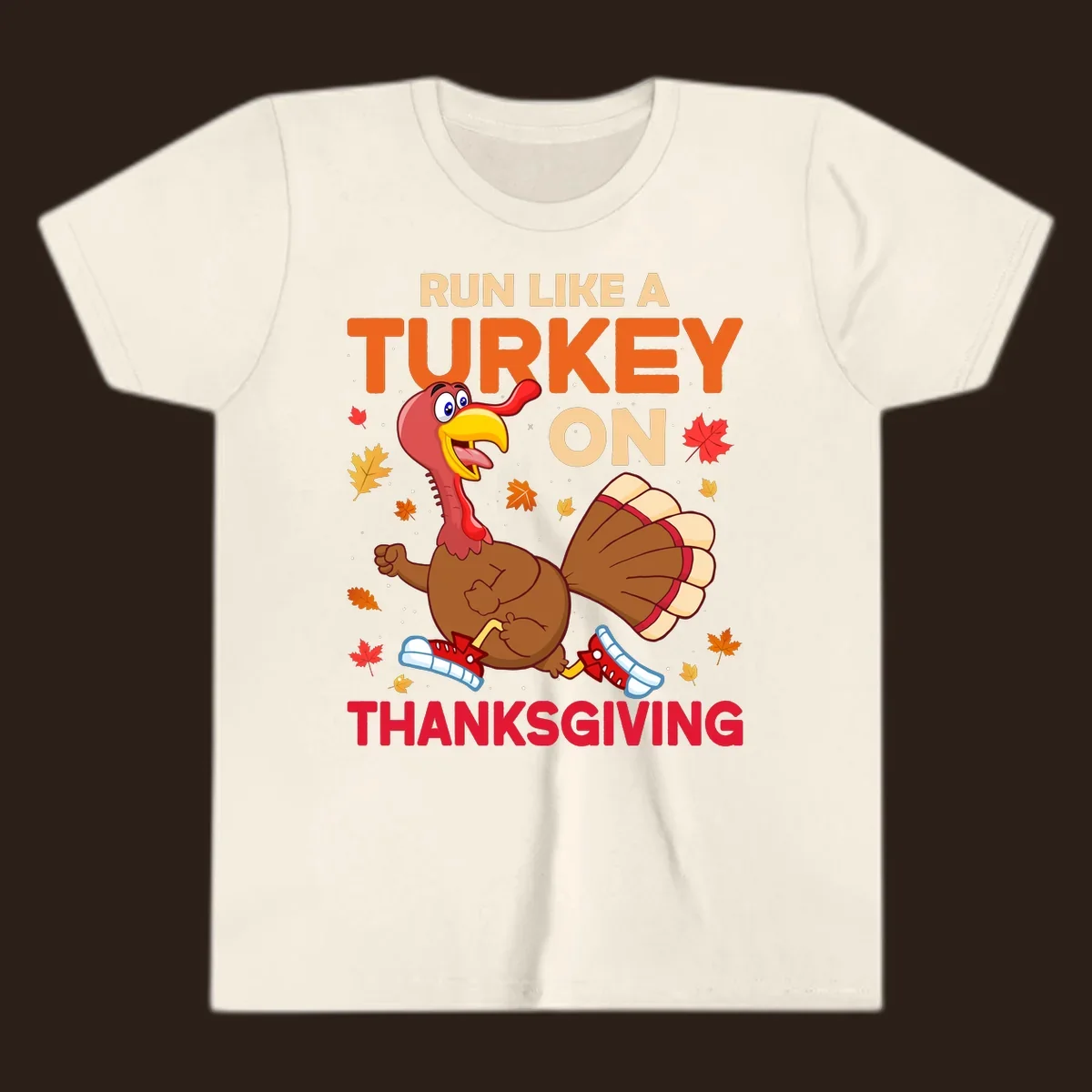 Cartoon turkey running with text Run Like A Turkey On Thanksgiving, autumn leaves and snowflakes.