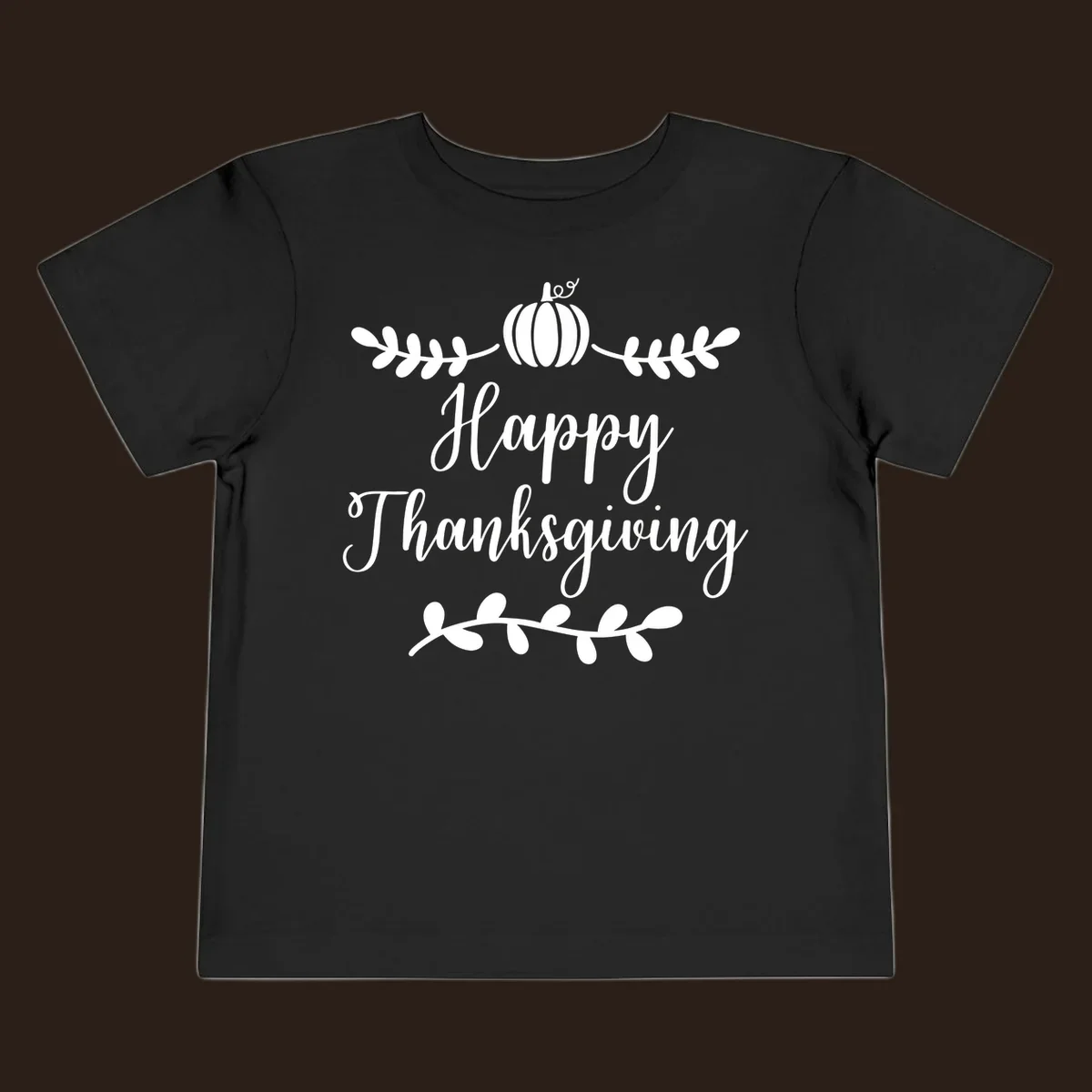Happy Thanksgiving script text with pumpkin and leaves graphic
