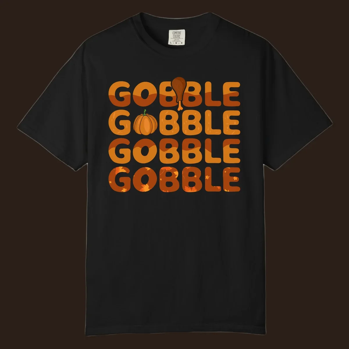 Gobble Gobble Thanksgiving text with pumpkin and turkey leg graphic
