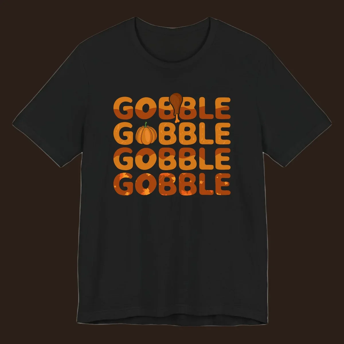 Gobble Gobble Thanksgiving text with pumpkin and turkey leg graphic
