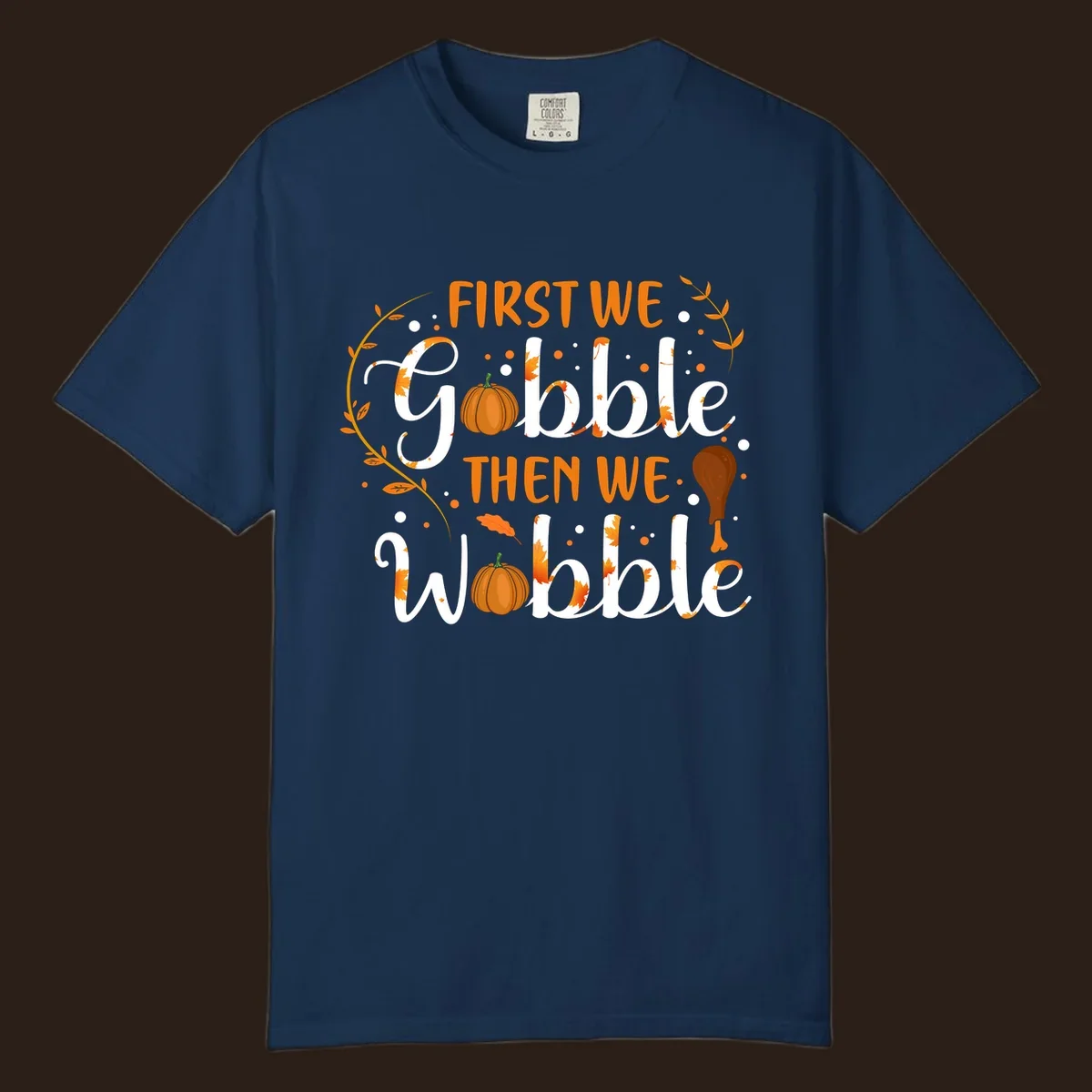 First we gobble then we wobble thanksgiving design with pumpkins and fall leaves.