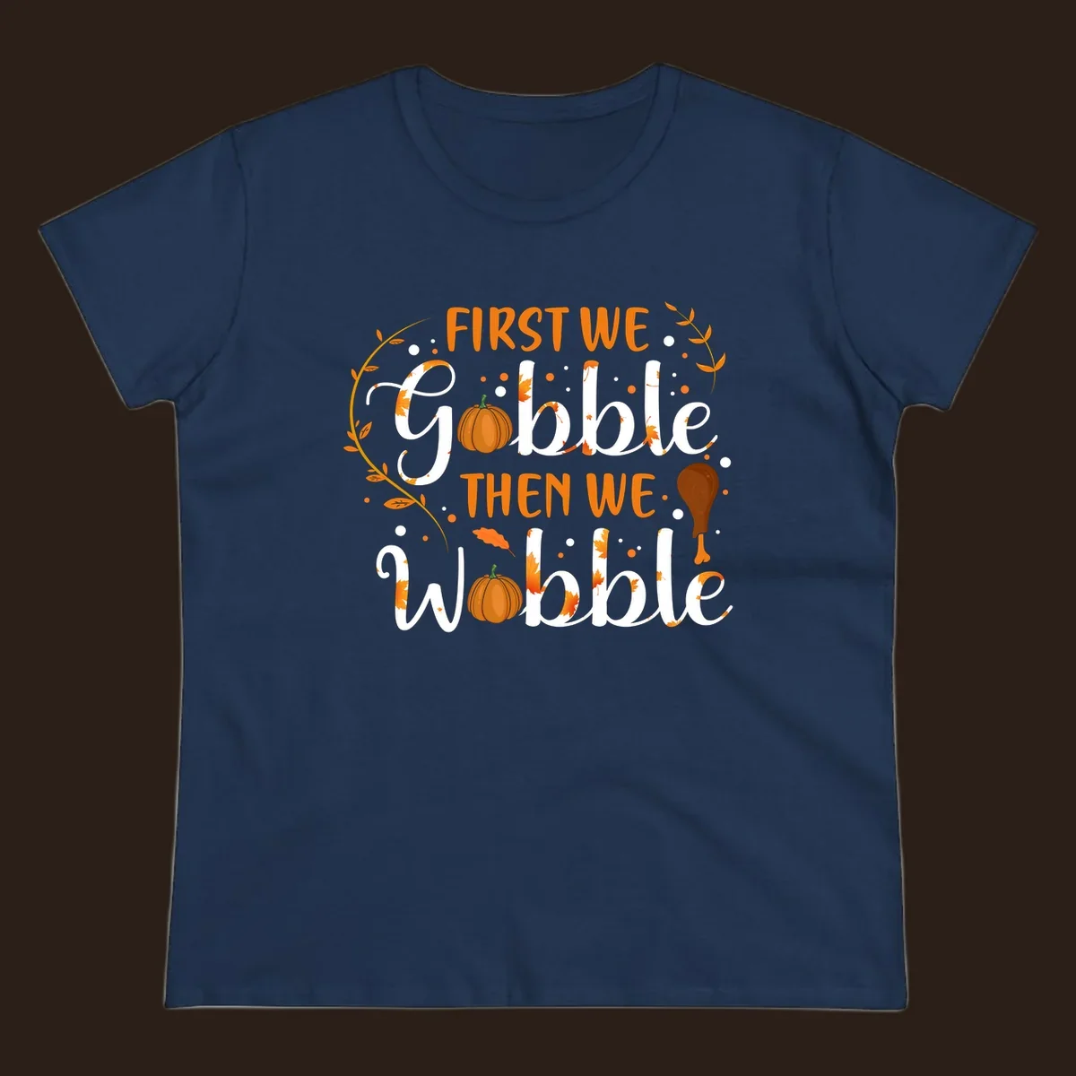 First we gobble then we wobble thanksgiving design with pumpkins and fall leaves.
