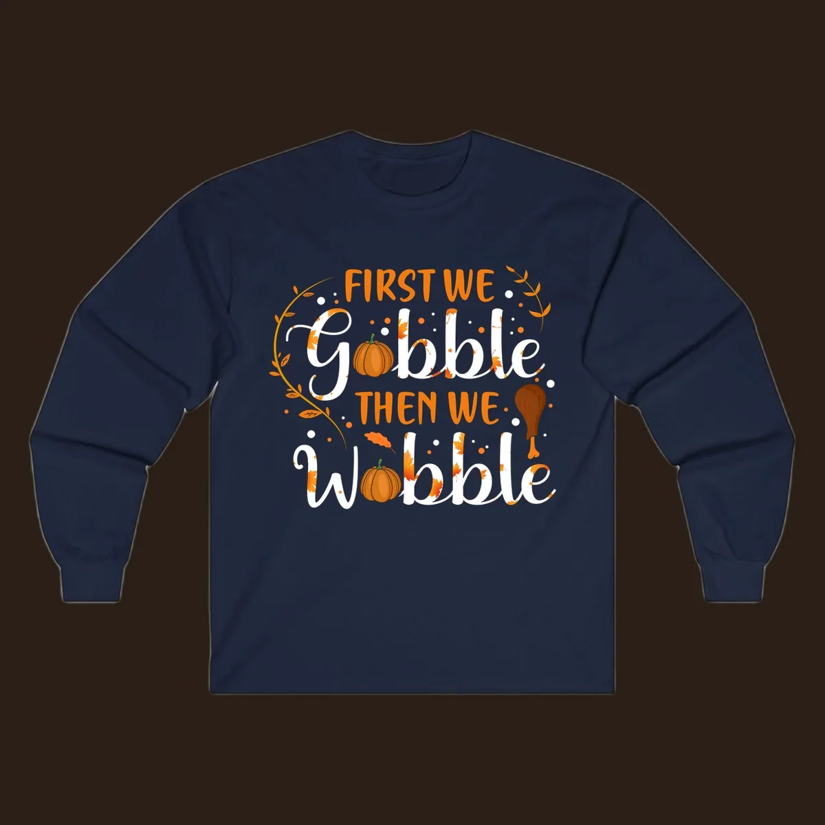 First we gobble then we wobble thanksgiving design with pumpkins and fall leaves.
