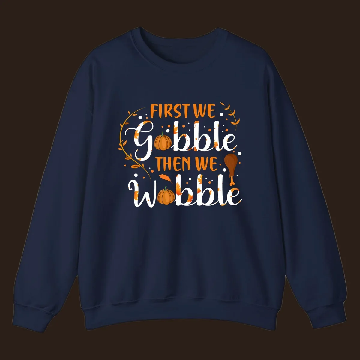 First we gobble then we wobble thanksgiving design with pumpkins and fall leaves.
