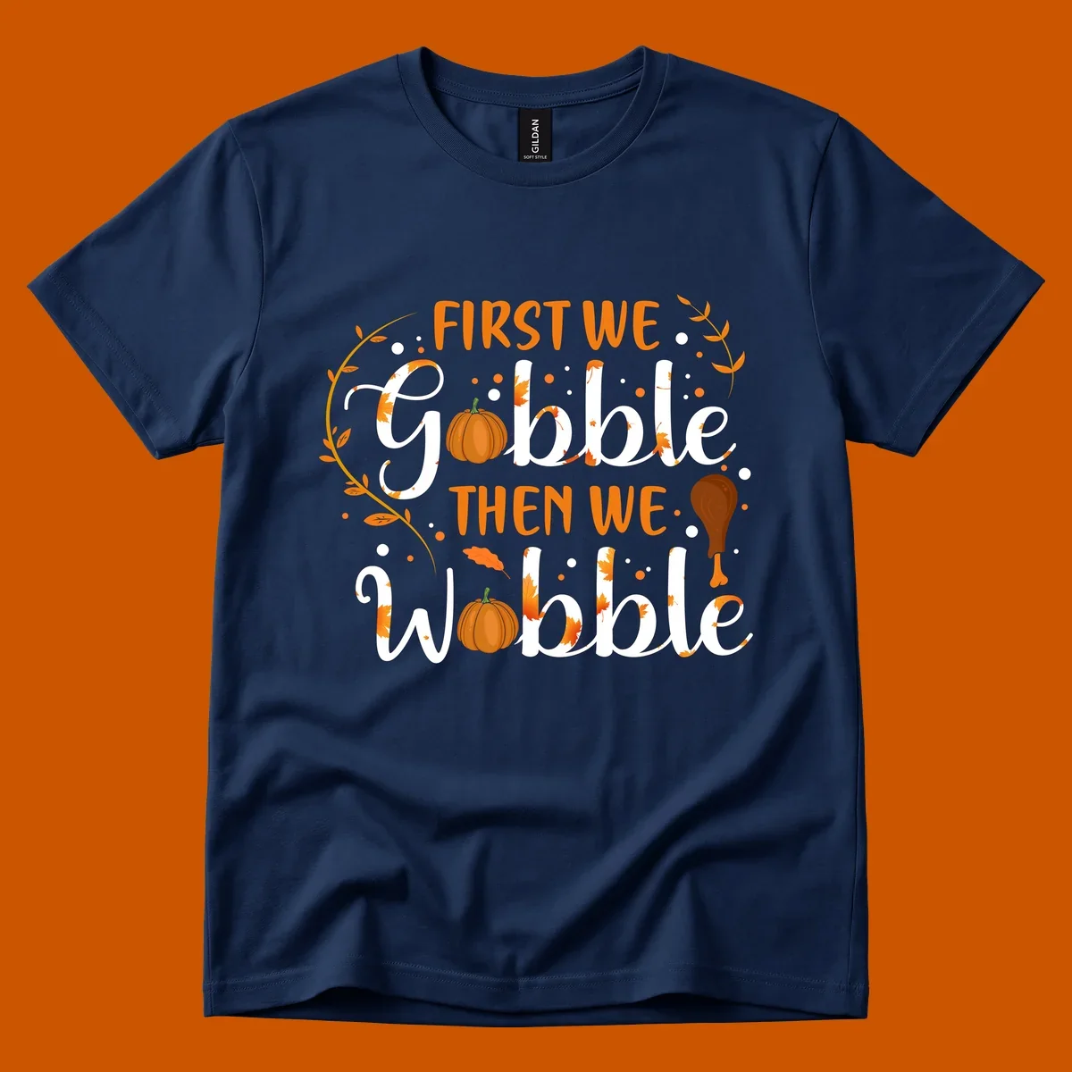 First we gobble then we wobble thanksgiving design with pumpkins and fall leaves.