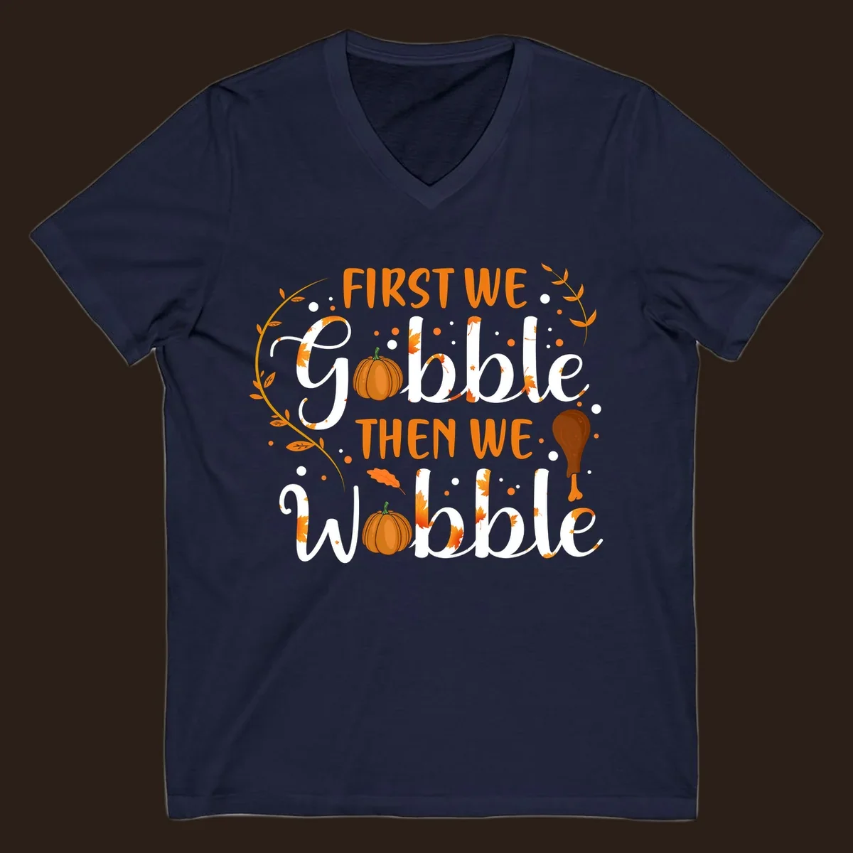 First we gobble then we wobble thanksgiving design with pumpkins and fall leaves.