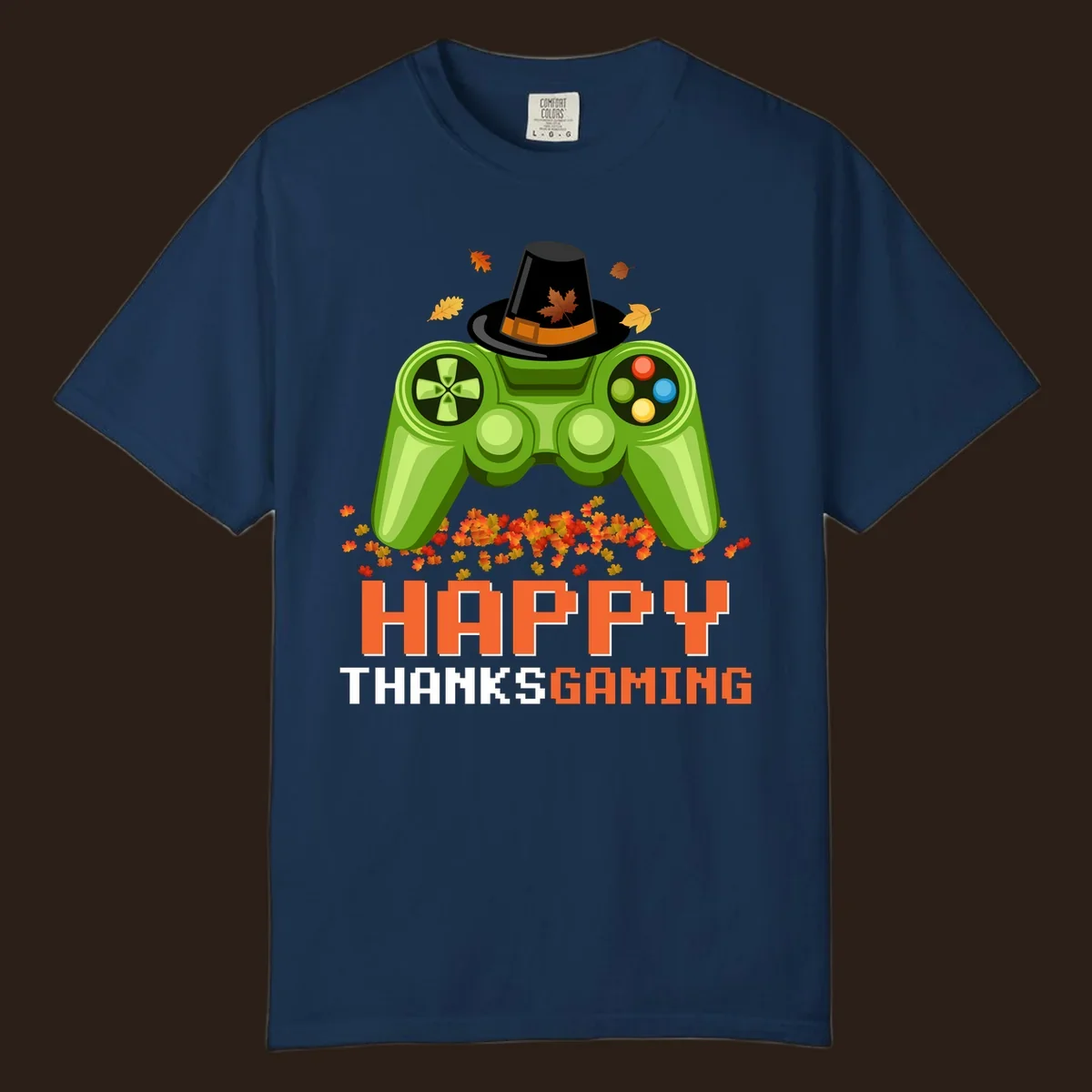 Happy Thanksgaming design with a video game controller, pilgrim hat, and fall leaves.