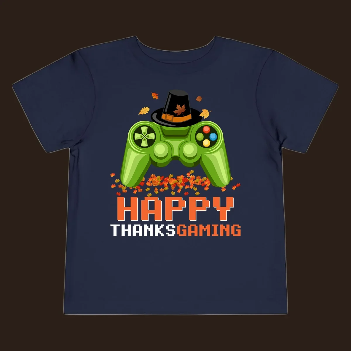 Happy Thanksgaming design with a video game controller, pilgrim hat, and fall leaves.