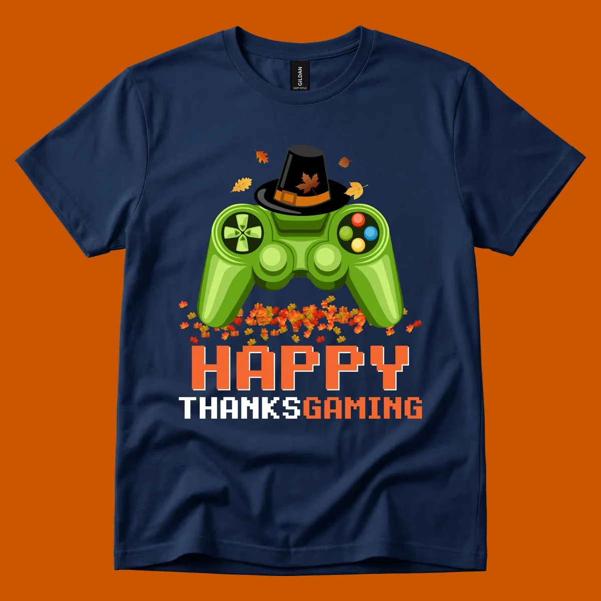 Happy Thanksgaming design with a video game controller, pilgrim hat, and fall leaves.