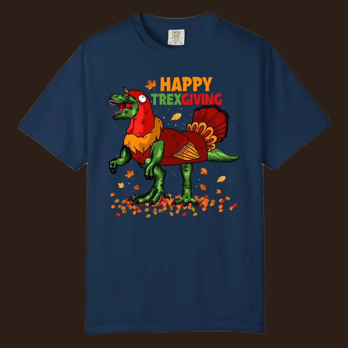 Dinosaur in a turkey costume with 'Happy Trexgiving' text and fall leaves.