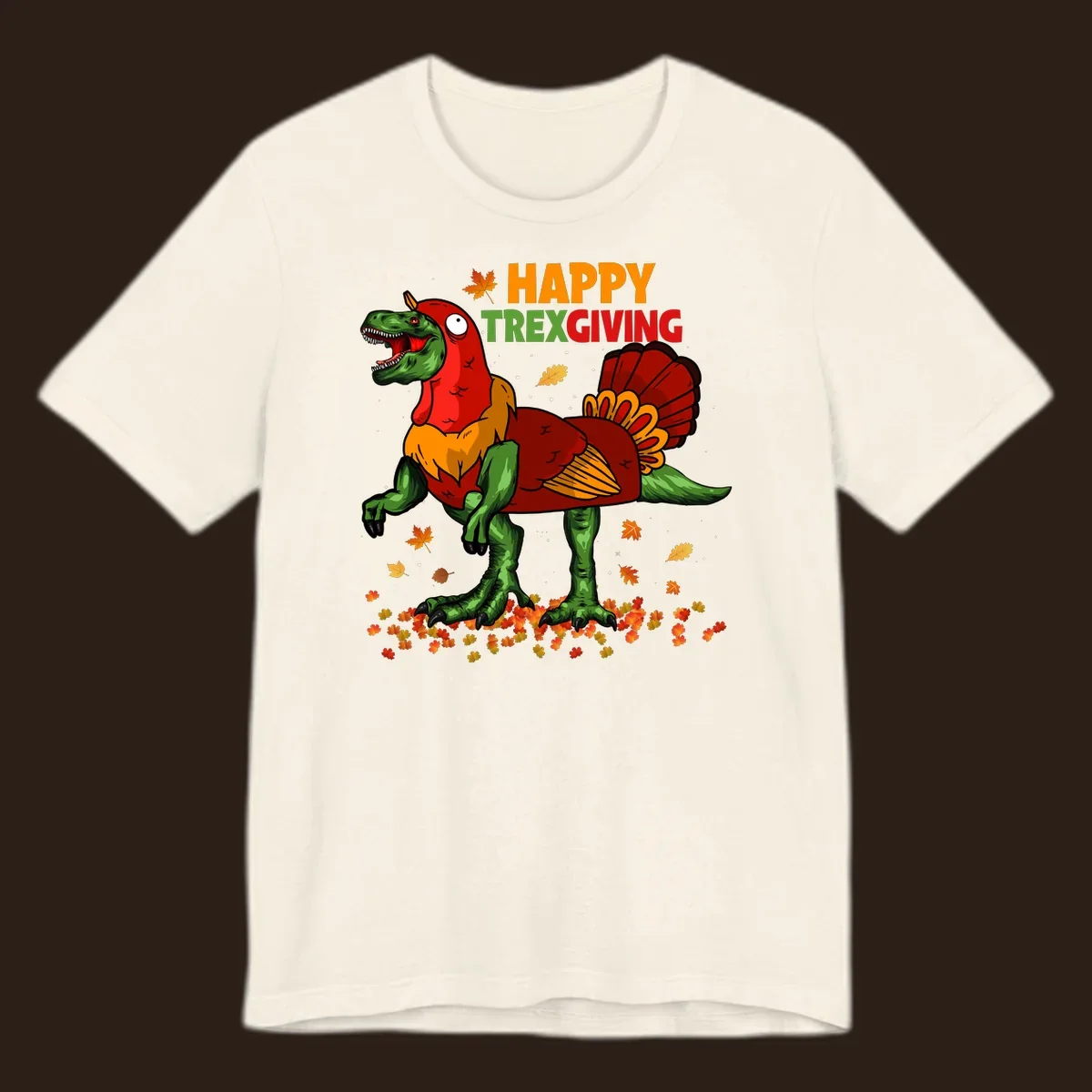 Dinosaur in a turkey costume with 'Happy Trexgiving' text and fall leaves.