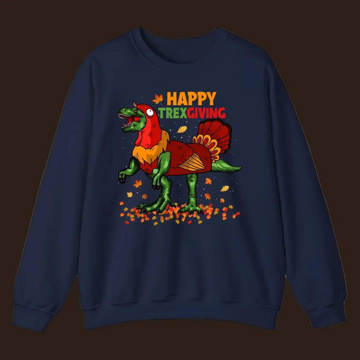 Dinosaur in a turkey costume with 'Happy Trexgiving' text and fall leaves.