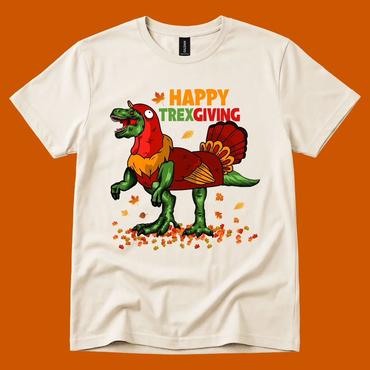 Dinosaur in a turkey costume with 'Happy Trexgiving' text and fall leaves.