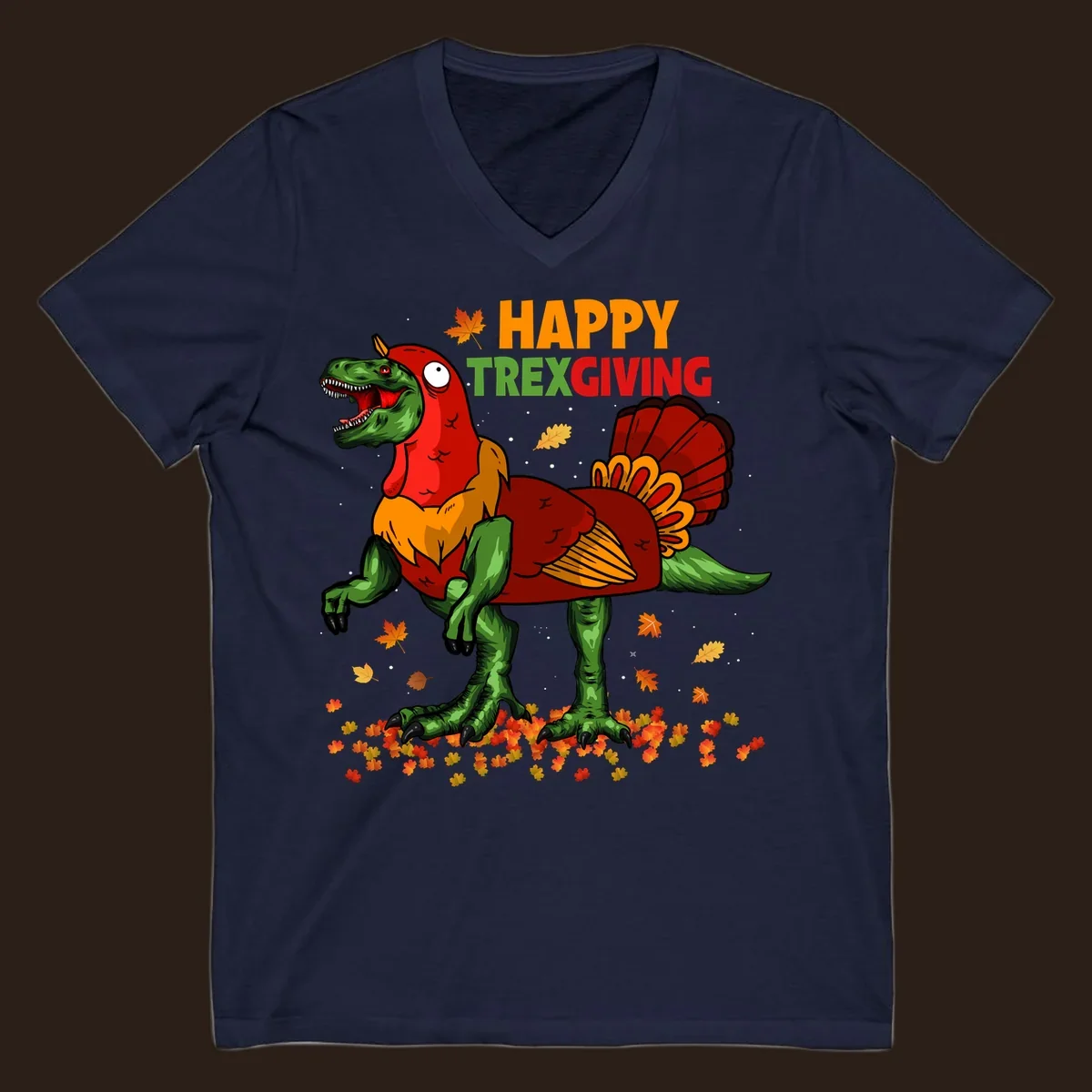 Dinosaur in a turkey costume with 'Happy Trexgiving' text and fall leaves.