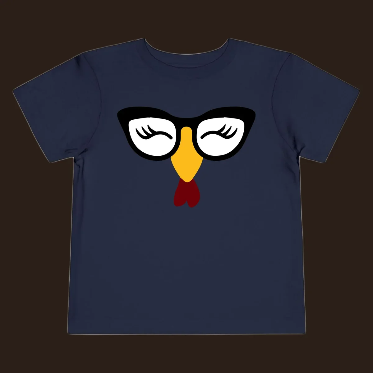 Nerdy turkey face with glasses illustration for Thanksgiving.