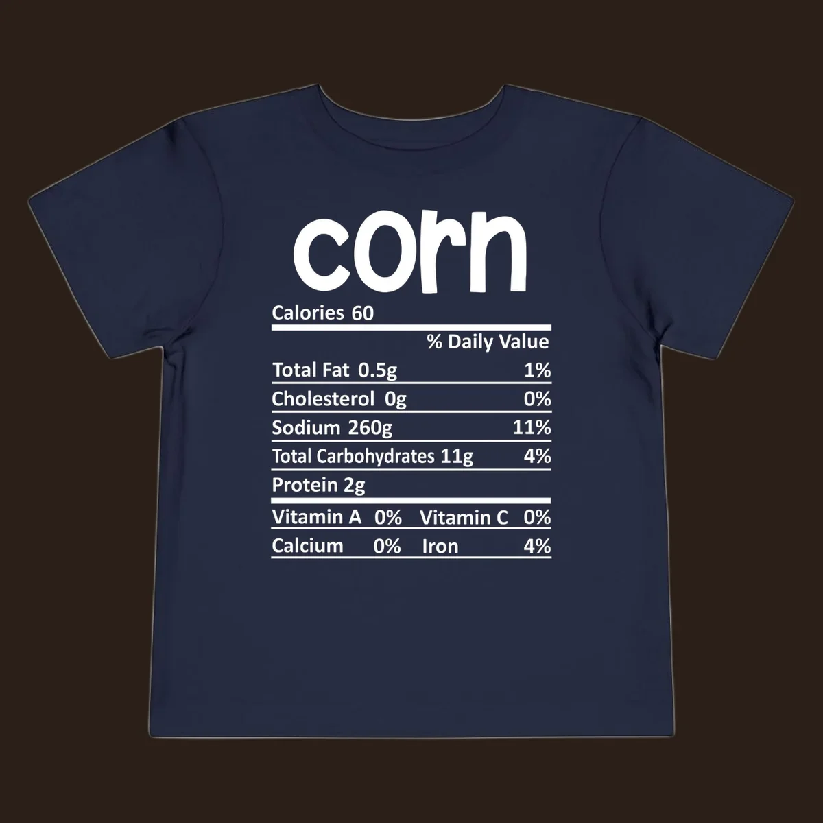 White text 'corn' and a nutritional facts label on a dark background.