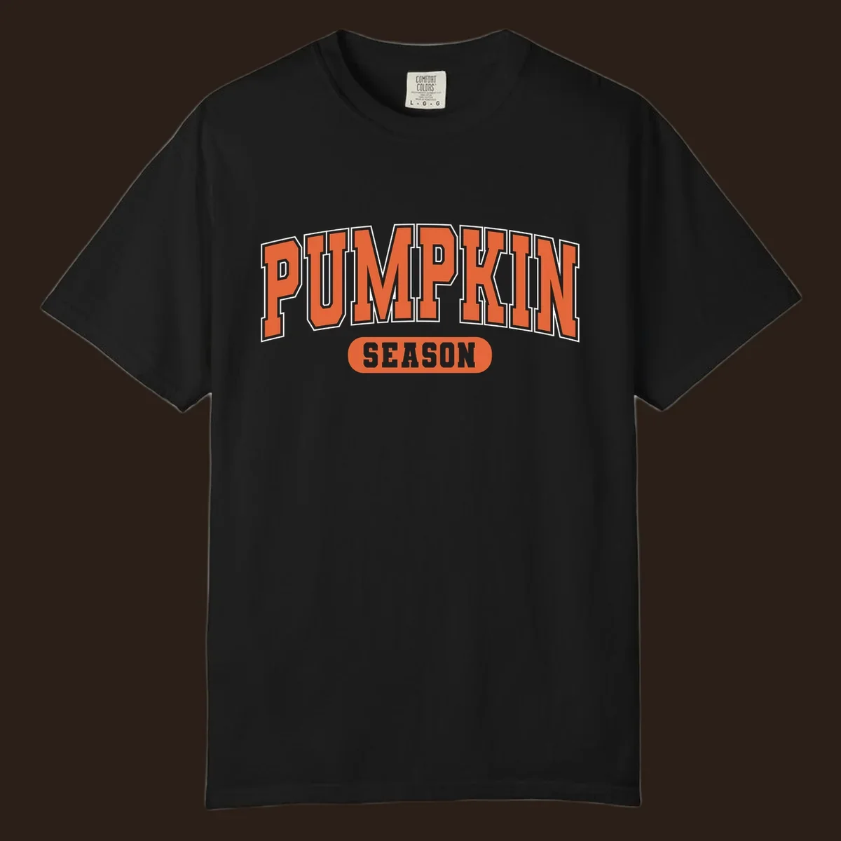 Pumpkin Season varsity text design in orange and white on black background.