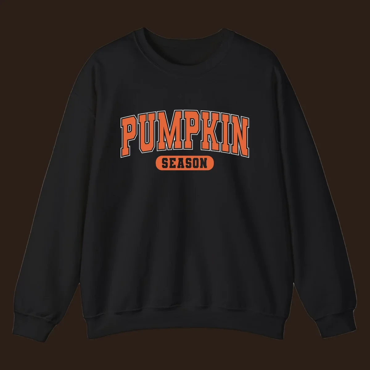 Pumpkin Season varsity text design in orange and white on black background.