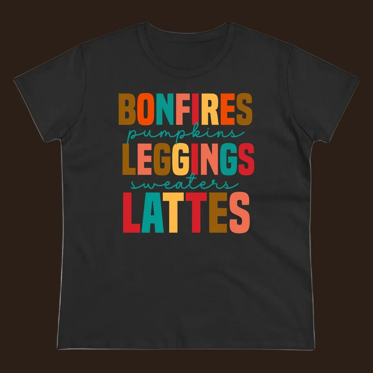 Fall vibes text design with words like Bonfires, Pumpkins, Leggings, Sweaters, Lattes in colorful block letters.