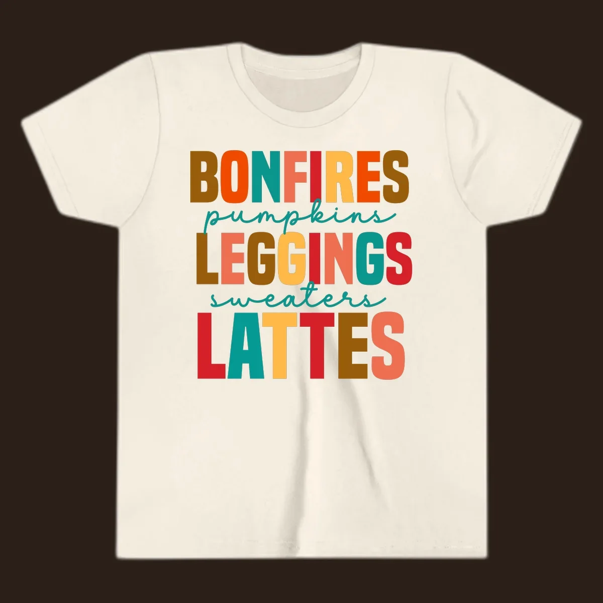 Fall vibes text design with words like Bonfires, Pumpkins, Leggings, Sweaters, Lattes in colorful block letters.
