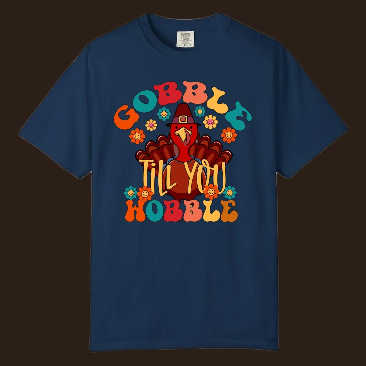 Gobble Till You Wobble turkey retro design with groovy flowers.