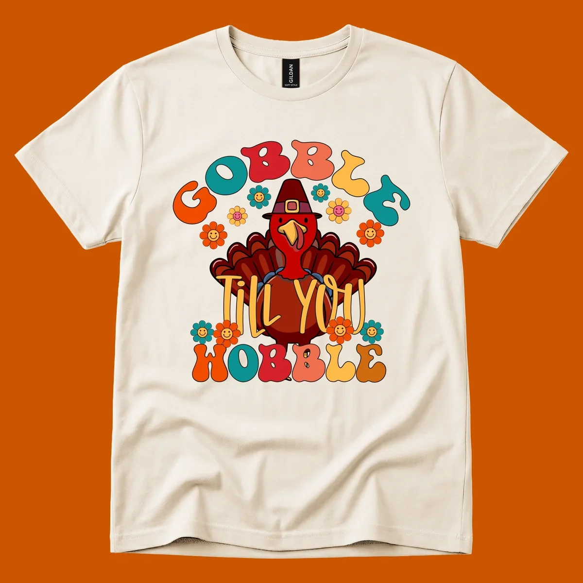 Gobble Till You Wobble turkey retro design with groovy flowers.
