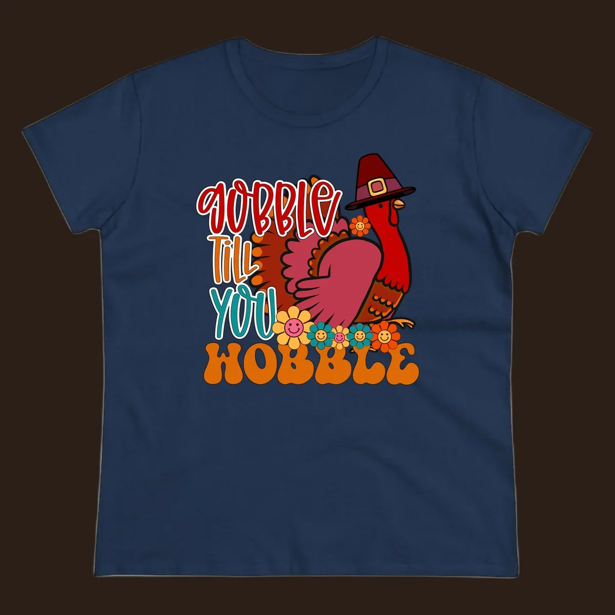 Gobble Till You Hobble Thanksgiving Turkey design with retro flowers and pilgrim hat.
