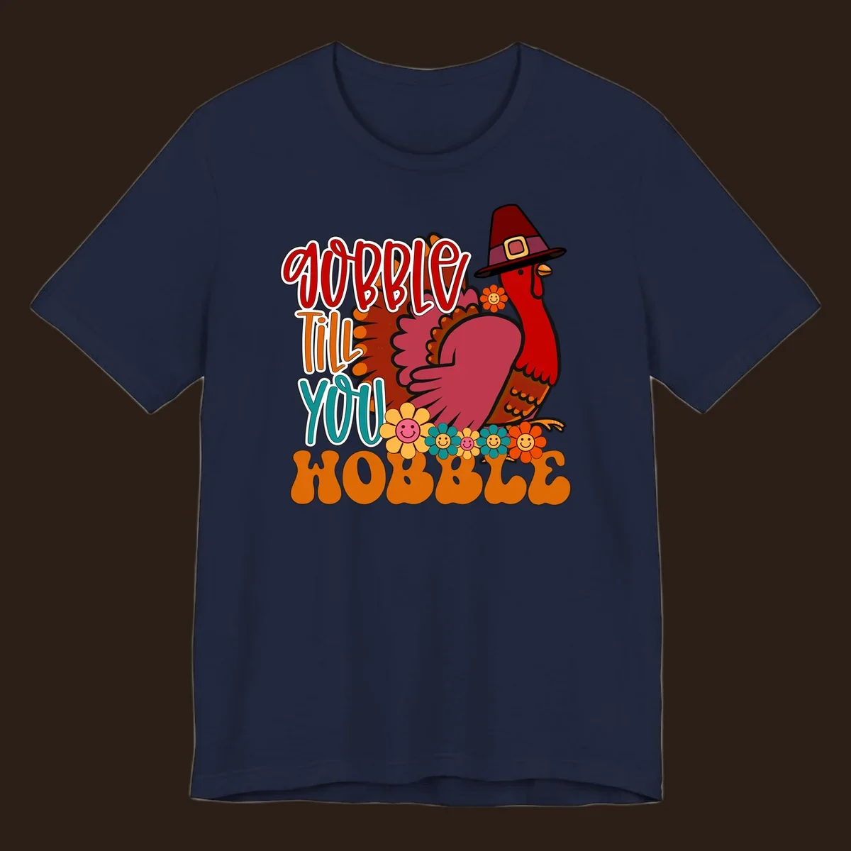 Gobble Till You Hobble Thanksgiving Turkey design with retro flowers and pilgrim hat.