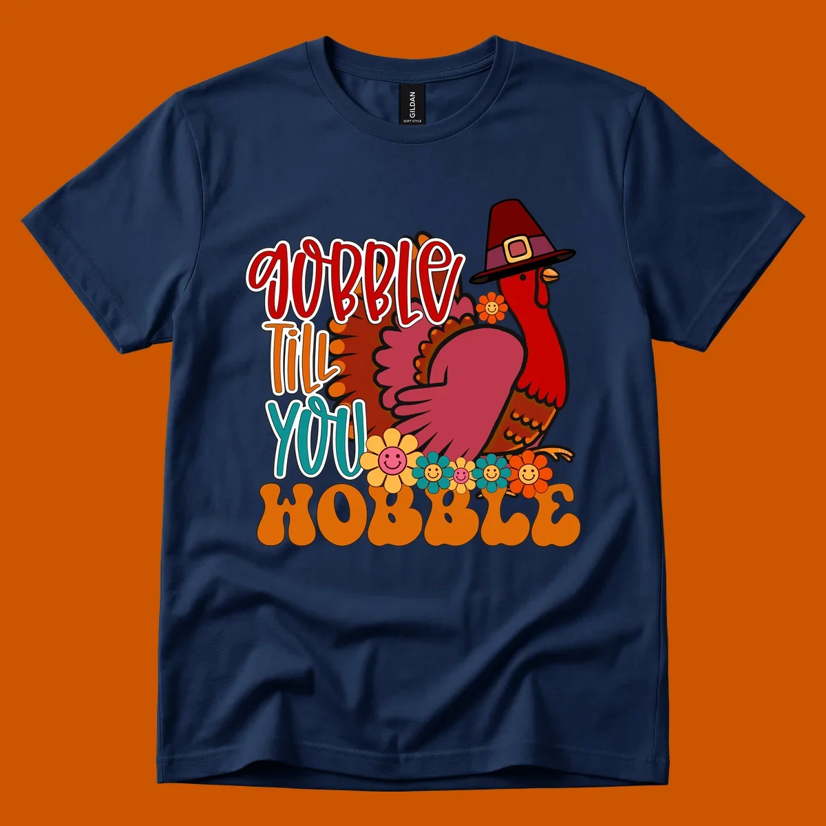 Gobble Till You Hobble Thanksgiving Turkey design with retro flowers and pilgrim hat.