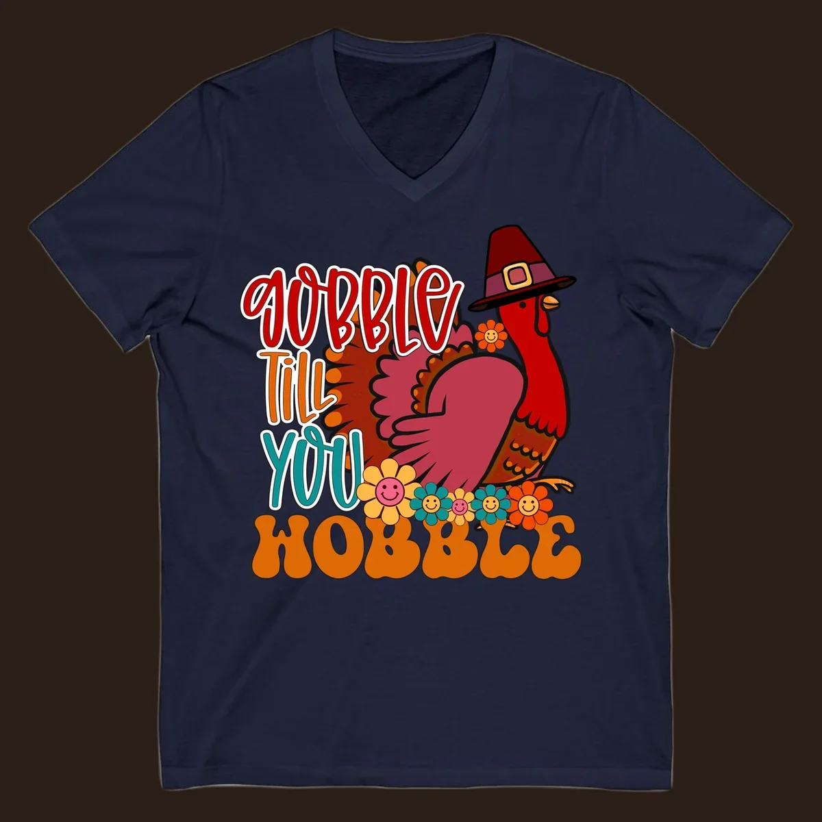 Gobble Till You Hobble Thanksgiving Turkey design with retro flowers and pilgrim hat.