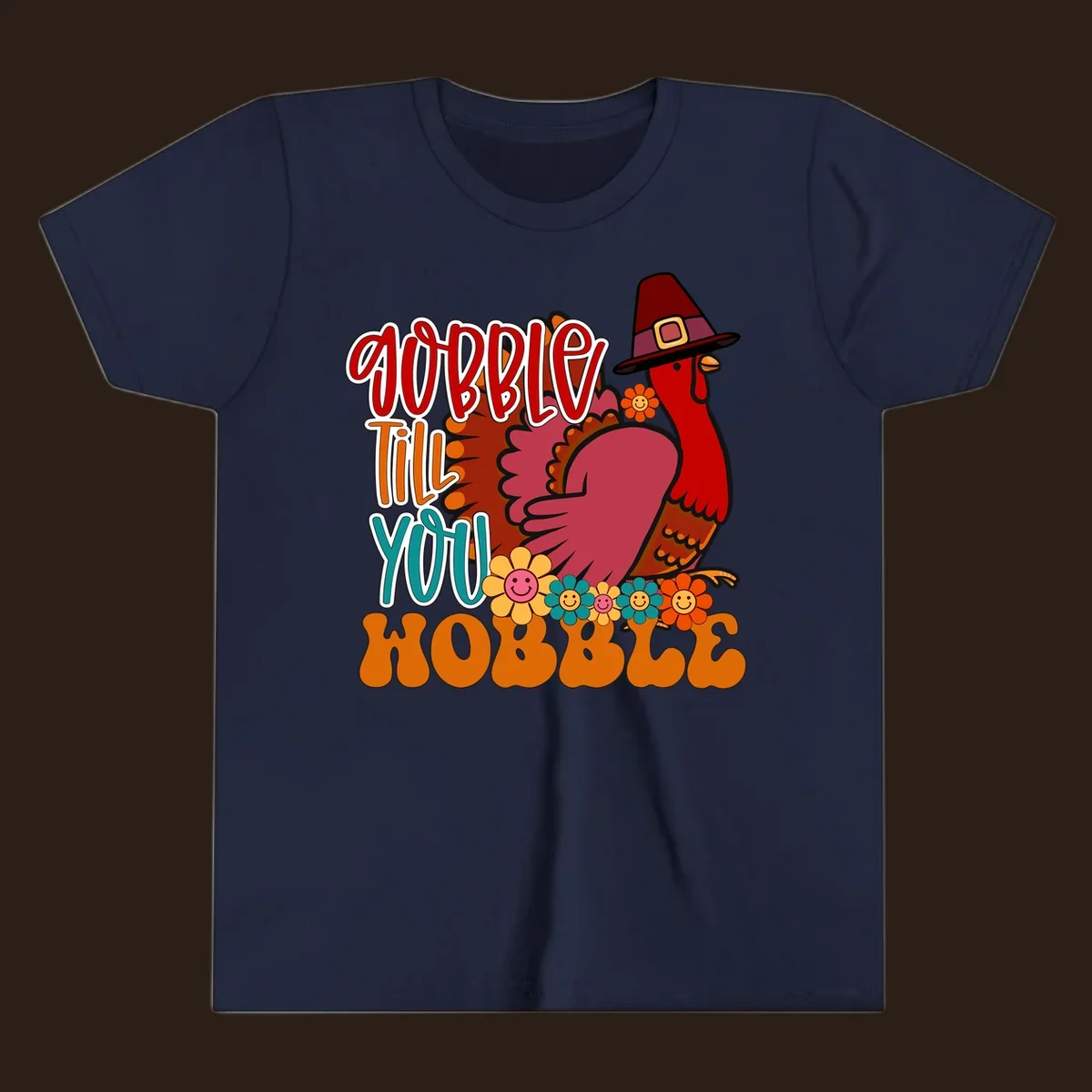 Gobble Till You Hobble Thanksgiving Turkey design with retro flowers and pilgrim hat.