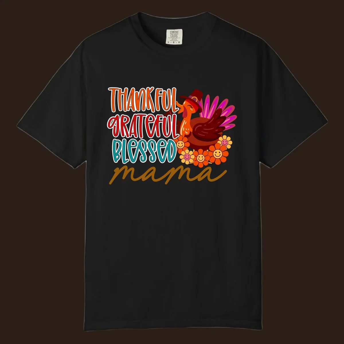 Thanksgiving mama turkey floral design with smiling flowers and colorful text.