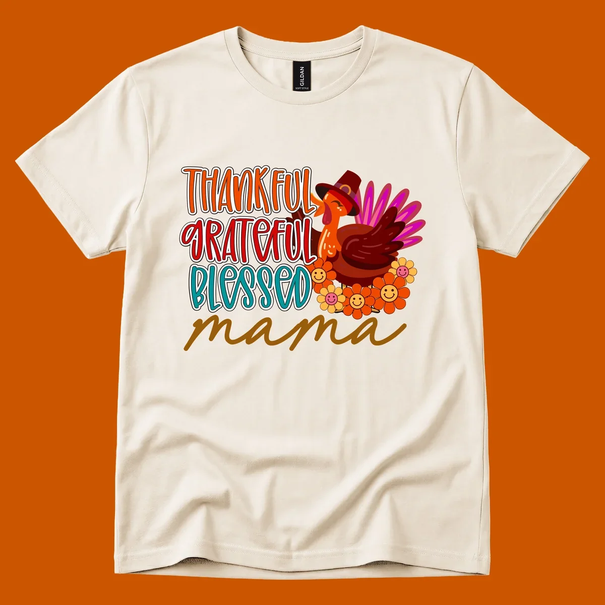 Thanksgiving mama turkey floral design with smiling flowers and colorful text.