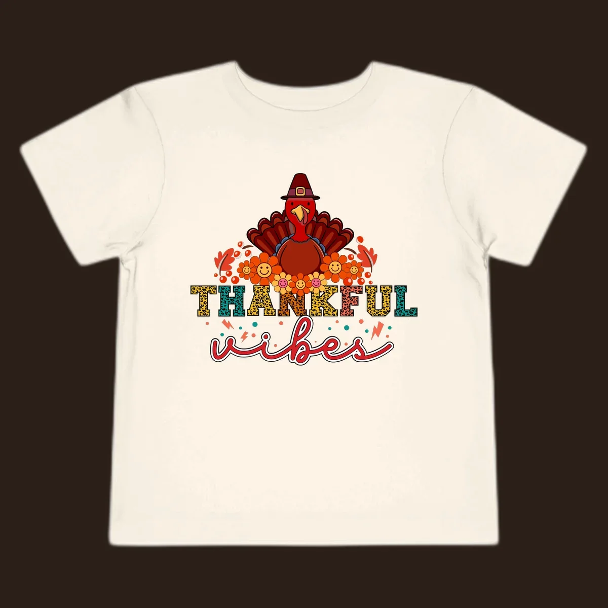 Retro Thanksgiving thankful vibes design with a turkey, flowers, and leopard print text.