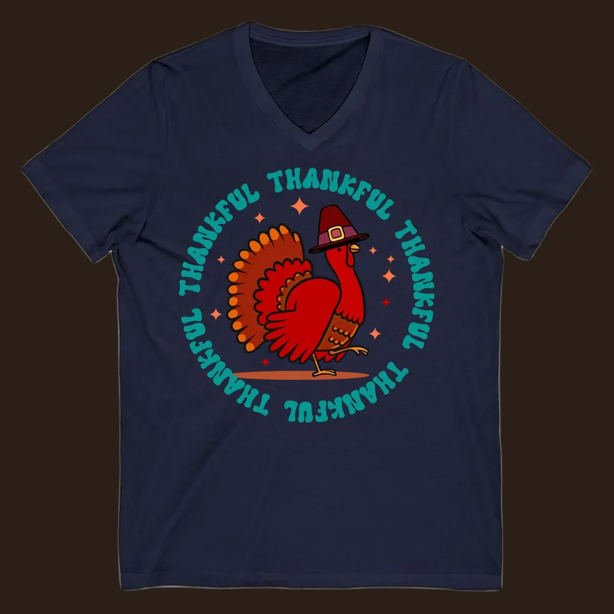 Thanksgiving turkey wearing a pilgrim hat with 'THANKFUL' text and starbursts.