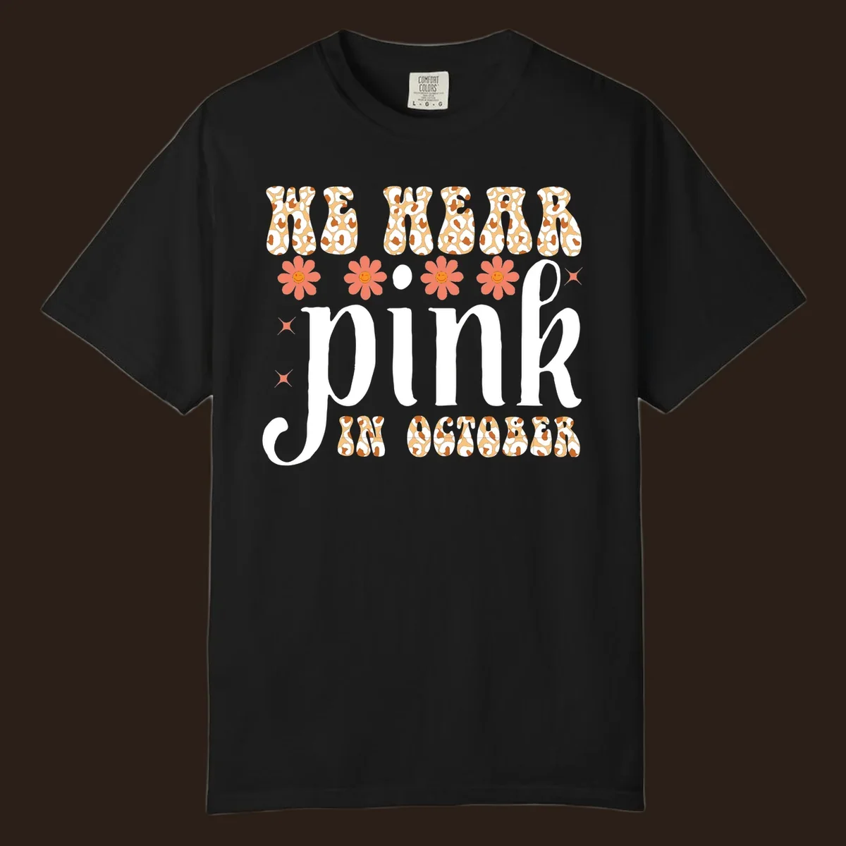 Retro "WE WEAR pink IN OCTOBER" design with leopard print and smiling flowers.