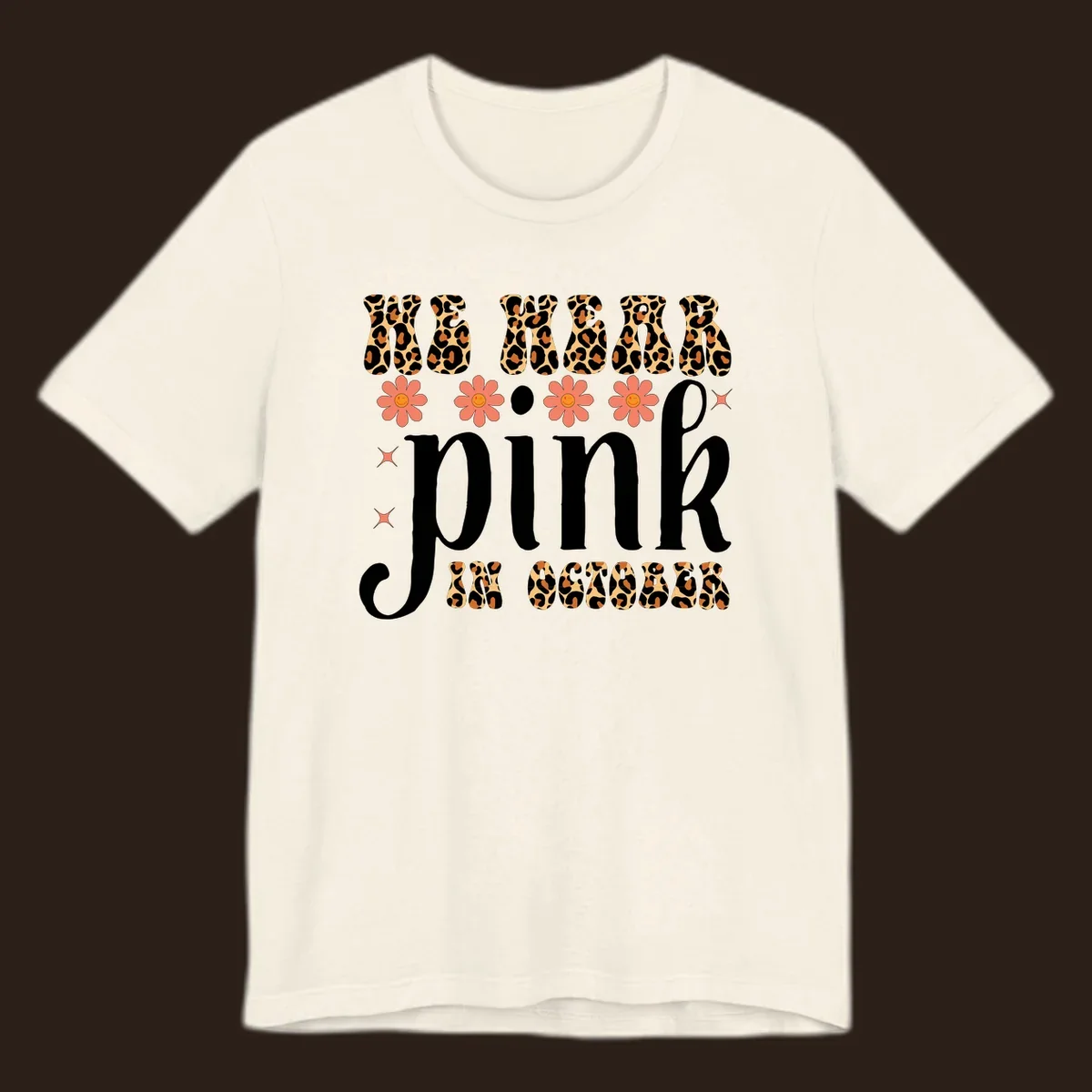 Retro "WE WEAR pink IN OCTOBER" design with leopard print and smiling flowers.
