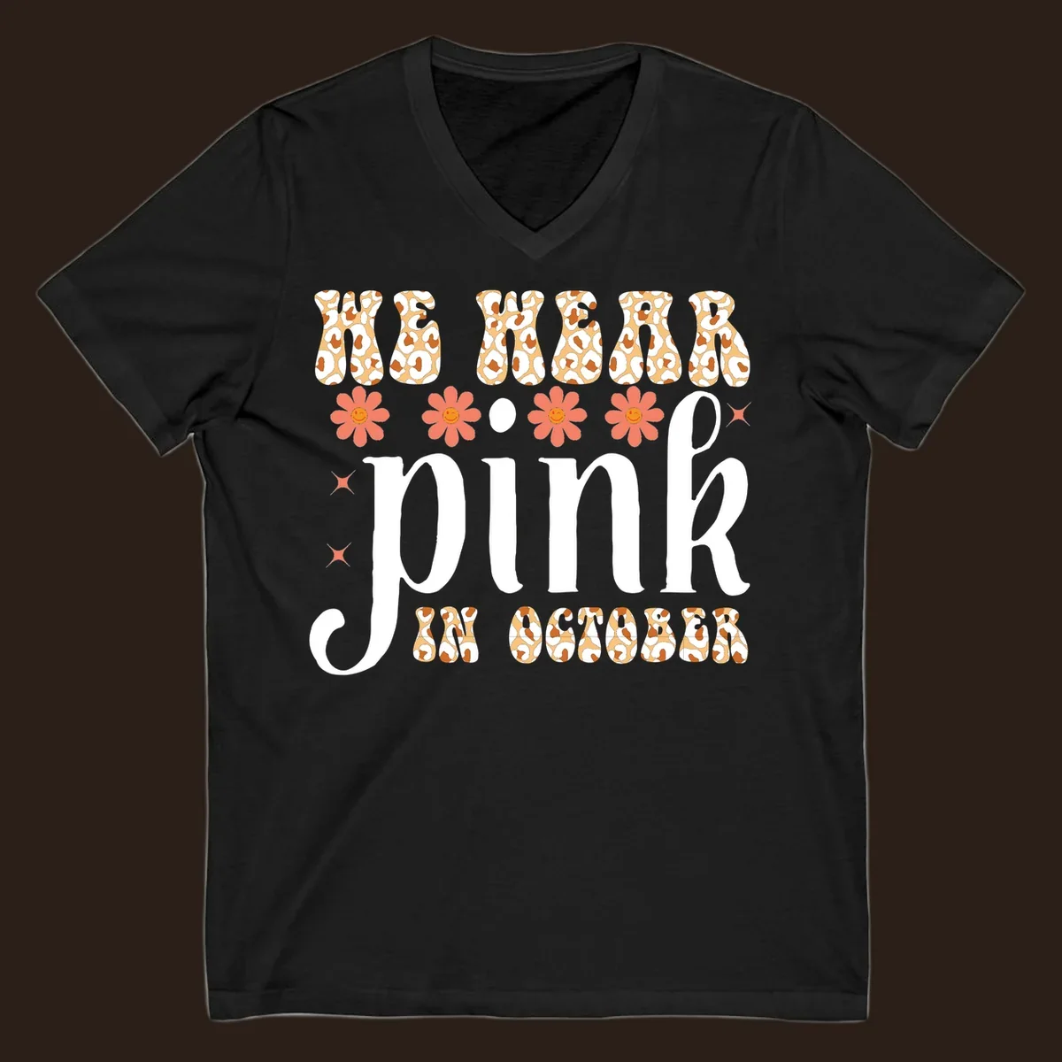 Retro "WE WEAR pink IN OCTOBER" design with leopard print and smiling flowers.