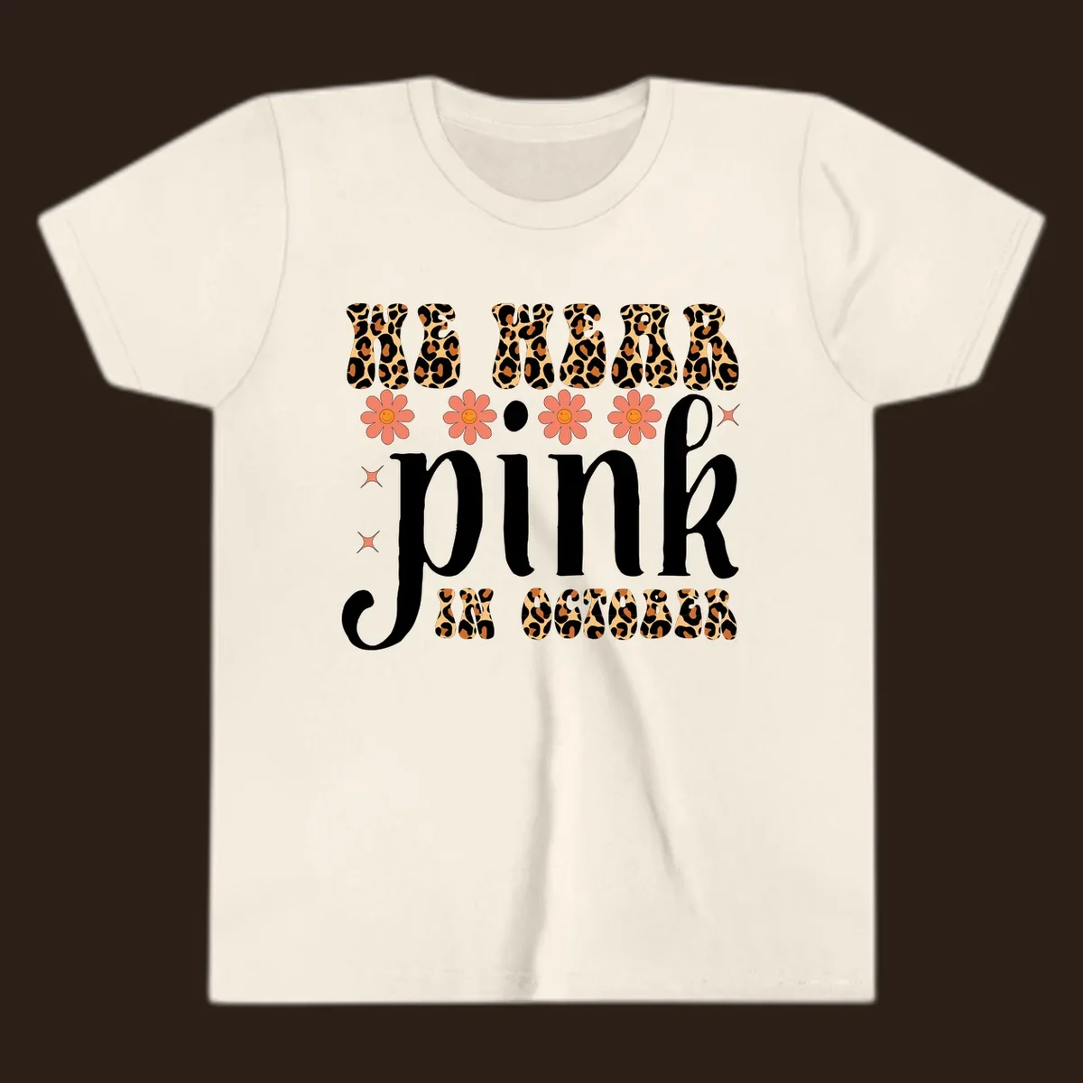 Retro "WE WEAR pink IN OCTOBER" design with leopard print and smiling flowers.