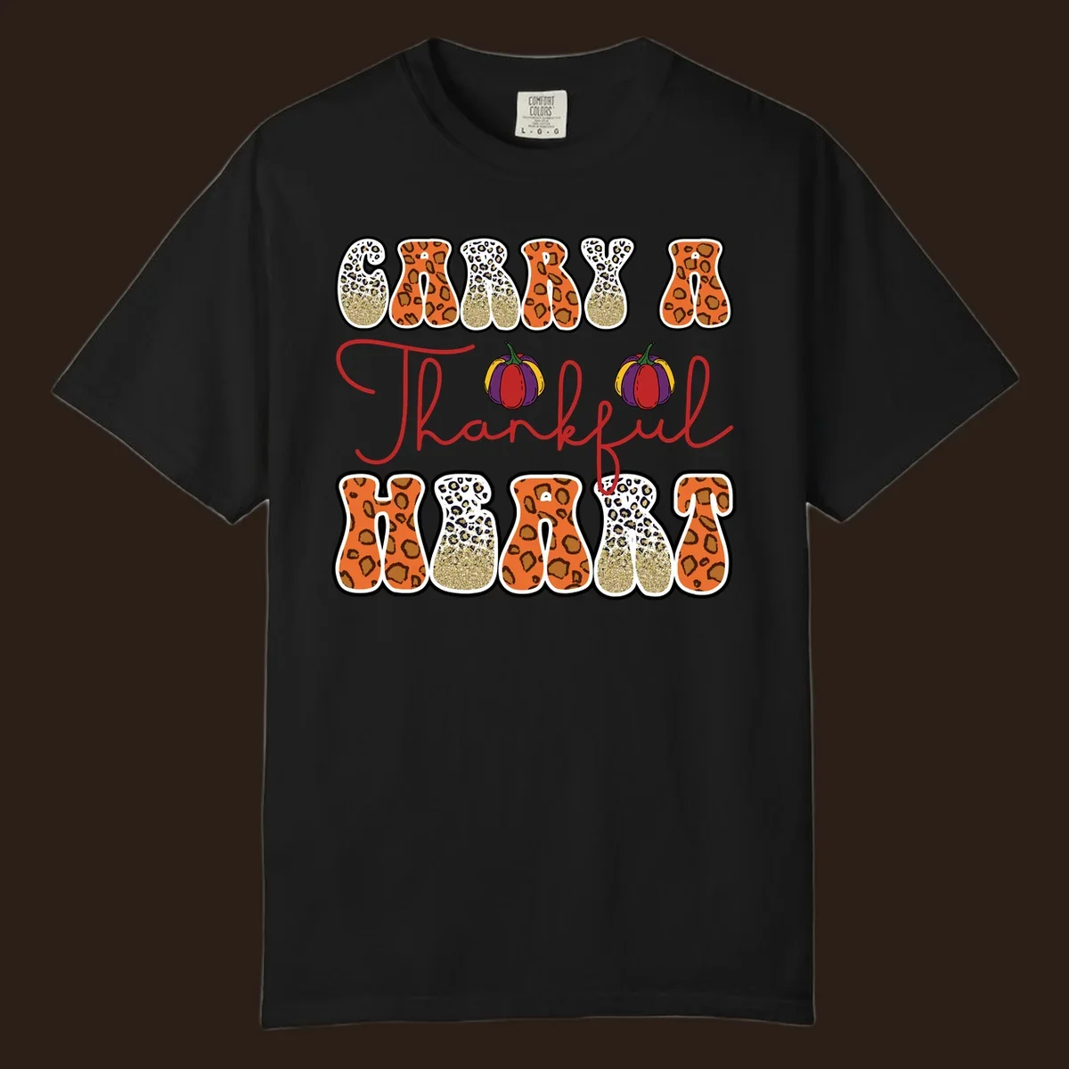 Carry A Thankful Heart design with leopard print letters and pumpkins.