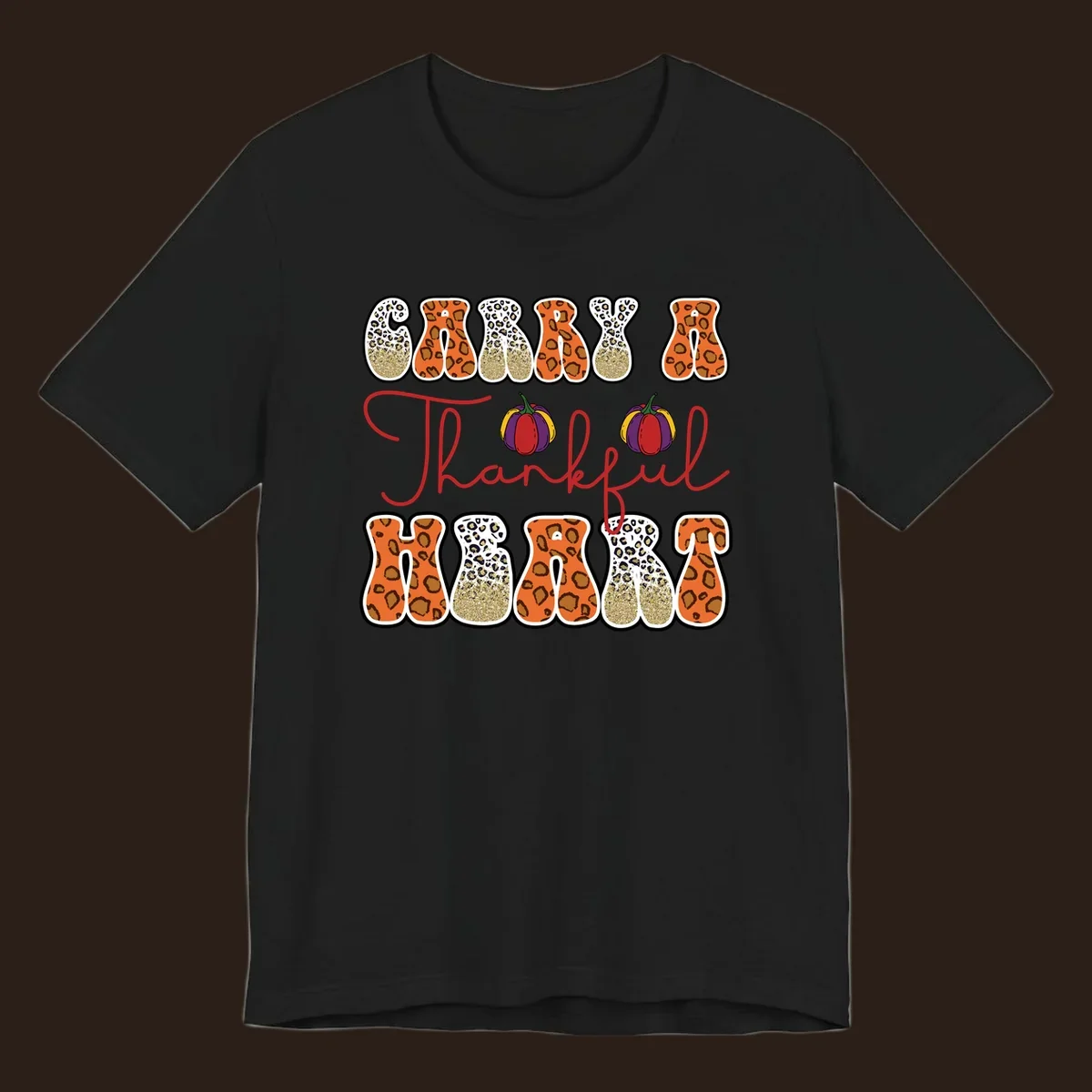 Carry A Thankful Heart design with leopard print letters and pumpkins.
