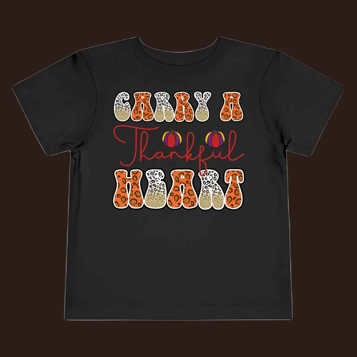 Carry A Thankful Heart design with leopard print letters and pumpkins.