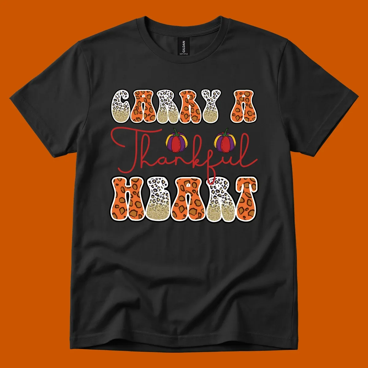 Carry A Thankful Heart design with leopard print letters and pumpkins.